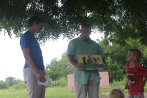 Storytelling at Sunday school under the big tree